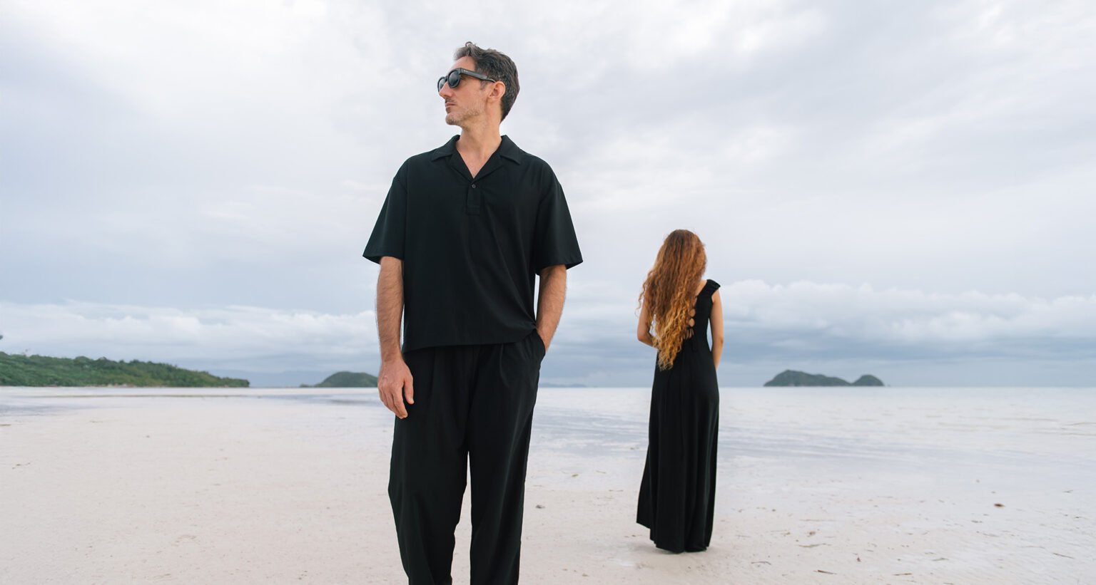 Thomas and Angela Kart, a husband-and-wife wedding photography and film team on a Koh Samui beach