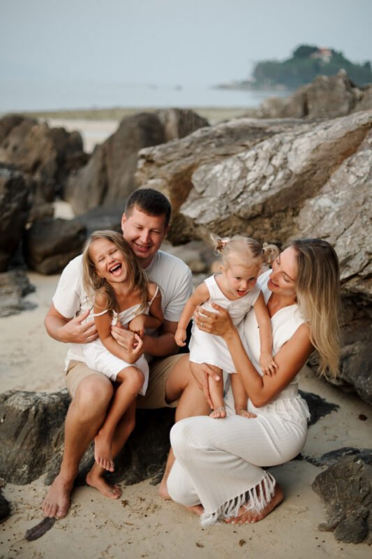 Mother and daughter laughing on the beach, Koh Samui family session